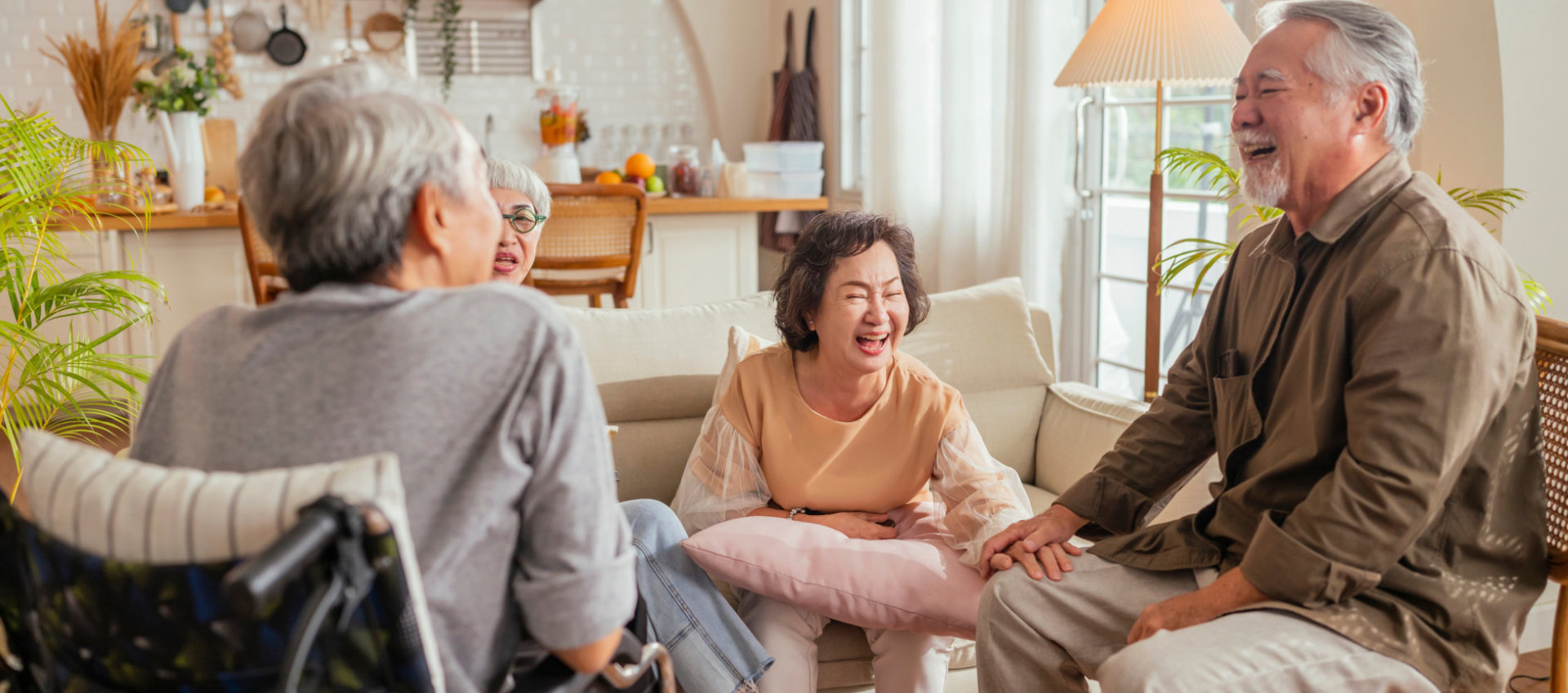 group of elderly smiling and talking